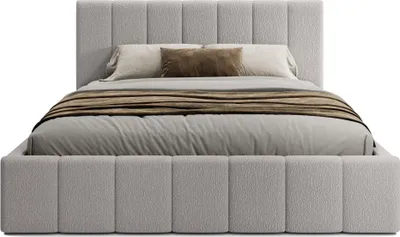 A bed with bedding is shown against a white background.