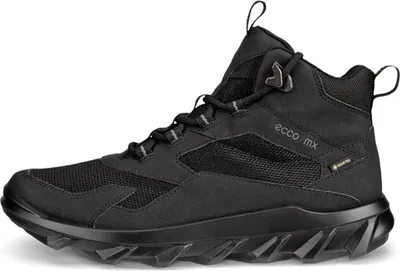 A studio shot of a black hiking boot.