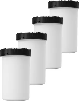 Four white storage containers with black lids are arranged diagonally on a white background.