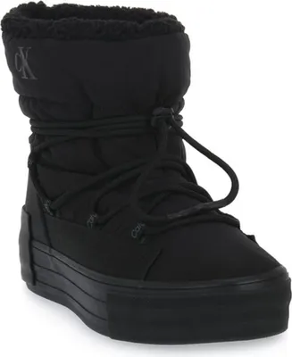 A black Calvin Klein snow boot is shown against a white background.