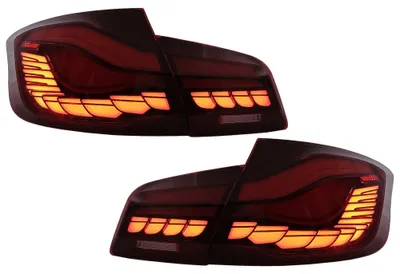 Image de Feux arrière OLED pour BMW Série 5 F10, rouges et transparents, avec clignotants dynamiques.