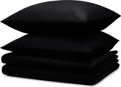 A stack of folded black bedding and two pillows.