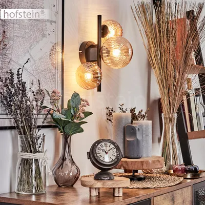 Produktbild von Isorella Wandlampe aus Metall/Riffelglas in Schwarz/Bernstein