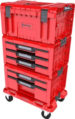 A stack of red Qbrick System Pro toolboxes with drawers, on wheels.