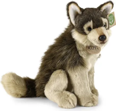 A plush toy wolf sitting on a white background.