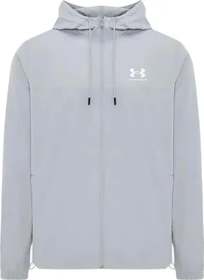 A light gray Under Armour windbreaker jacket is shown against a white background.