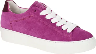 A single pink suede sneaker with white laces and a white platform sole is shown against a white background.