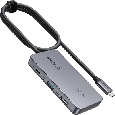 A gray USB-C hub with multiple ports and a connected cable, shown against a white background.