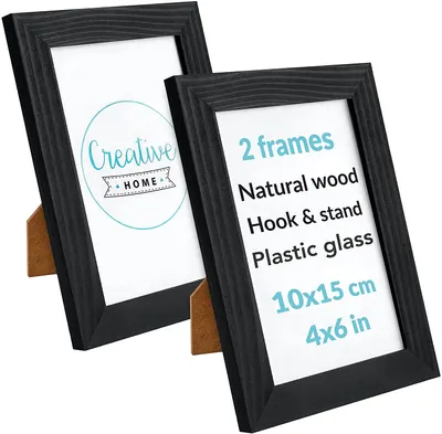 Two black photo frames are shown leaning against each other on a white background. The frame on the right has text describing its features and dimensions.