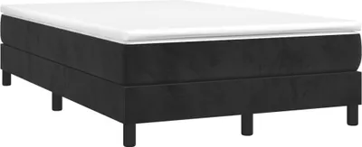 A black boxspring bed frame with a white mattress on top, shown from a side angle on a white background.