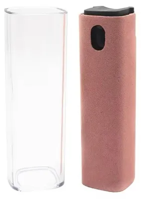 A clear glass bottle and a pink spray bottle are placed side-by-side on a white background.