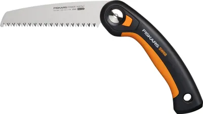 A Fiskars folding saw is shown against a white background.