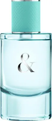 A close-up studio shot of a Tiffany & Co. Love Eau de Parfum spray bottle.