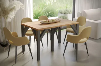 A dining table and chairs set in a modern, well-lit room with a large window overlooking a garden.