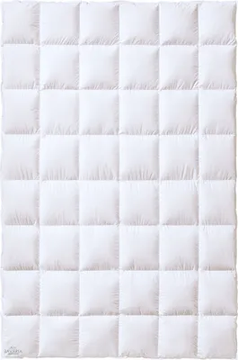 A white quilted comforter is shown flat against a white background.