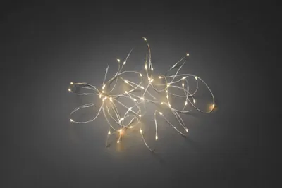 Produktbild von Konstsmide LED Tropfenlichterkette, 50 bernsteinfarbene Dioden, 3V Innentrafo, silberfarbener Draht - 6386-890