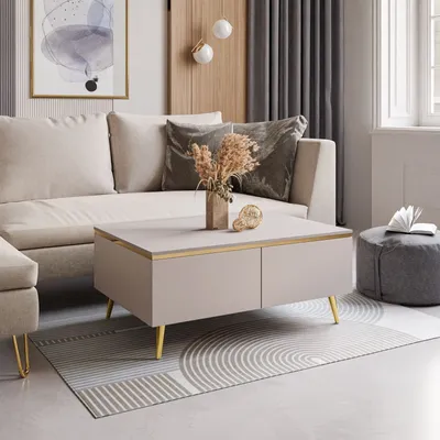 A modern living room scene with a couch, coffee table, and rug.