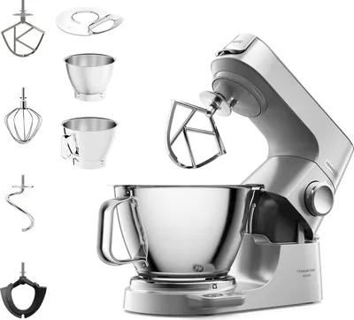 A silver Kenwood stand mixer with various attachments displayed around it, set against a white background.