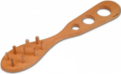 A wooden spaghetti server and portioner is shown against a white background.