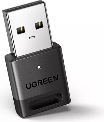 A close-up studio shot of a Ugreen USB Bluetooth adapter.