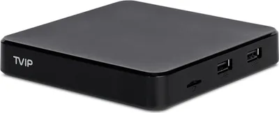 A black TVIP S-Box v.706 4K UHD Android 11 IP-Receiver is shown from a diagonal front-right perspective on a white background.
