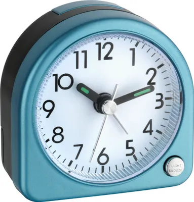 A close-up studio shot of a blue analog alarm clock.