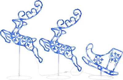 Three illuminated blue reindeer and a sleigh Christmas decoration set against a white background.