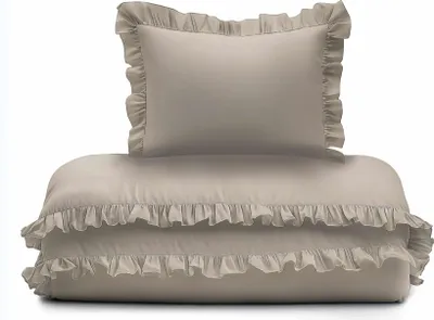 A stack of taupe bedding with ruffles, including a pillow and a duvet or comforter.