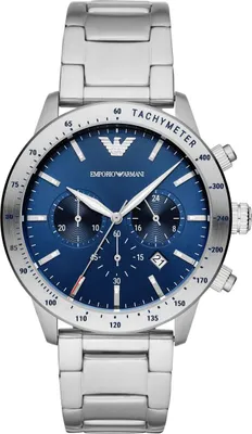 A close-up studio shot of a silver Emporio Armani watch with a blue dial.
