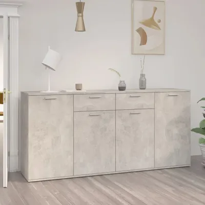 A sideboard with drawers and doors in a room.
