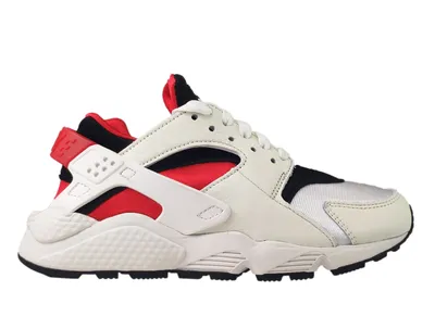 A side view of a Nike Air Huarache shoe against a white background.