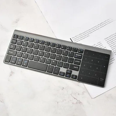 Immagine prodotto di Tastiera Wi-Fi a 2,4 GHz con touchpad integrato: tastiera e mouse piatti con telecomando