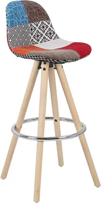 A single bar stool with a patchwork seat and wooden legs against a white background.