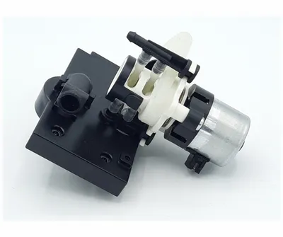 A product shot of a pump assembly on a white background.