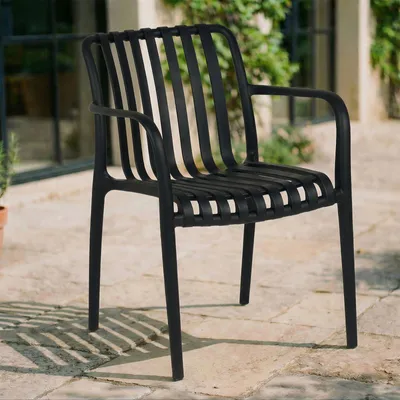 Produktbild von Gartenstühle TULIPANO im 6er Set aus hochwertigem Kunststoff in schwarz. Wetterfest, stapelbar, UV-beständiges Material für Garten, Balkon & Terrasse.