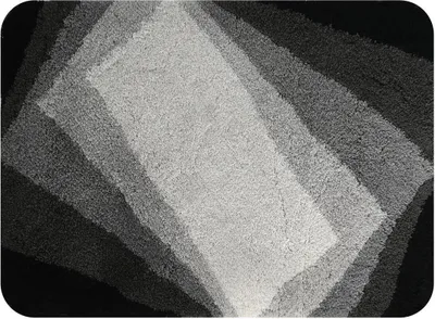 Produktbild von Spirella Badteppich Badematte „Kali“ Duschvorleger Mikrofaser Hochflor | flauschig | rutschhemmend | geeignet für Fußbodenheizung | 70x120 cm | Grau