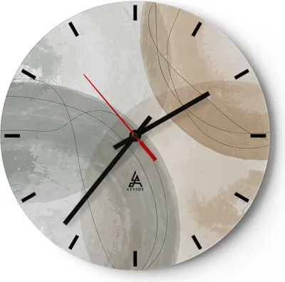 A round wall clock with an abstract watercolor design.