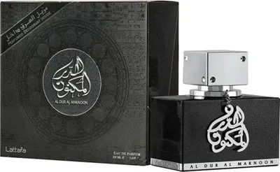 A perfume bottle and its box are displayed side-by-side against a white background.