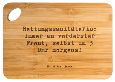 Produktbild von Mr. & Mrs. Panda Holzbrett Spruch Rettungssanitäterin Mut - Transparent - Geschenk, Frühstücksbrett, kreative Geschenke, Beruf, Nachteinsatz, schneidbrett, Notfall, Brett