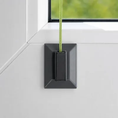 Produktbild von Klebeplatten mit Spannschuh für Plissees, universal, anthrazit, 4 Stück inkl. Reinigungstuch, Montage ohne Bohren am Fensterrahmen