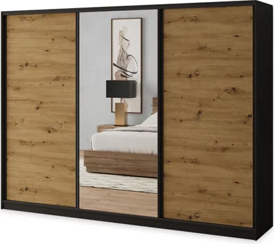 A wardrobe with mirrored doors in a bedroom setting.