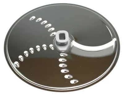 A close-up, top-down view of a food processor blade.