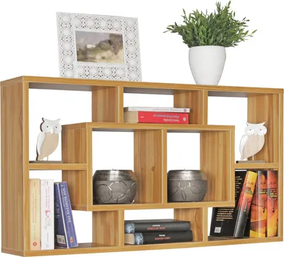 A wooden shelf unit with various decorative items and books.