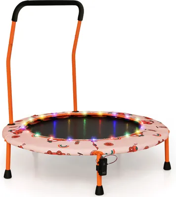 A child's mini trampoline with an orange handle and legs, a pink mat with cartoon patterns, and colorful LED lights around the edge.