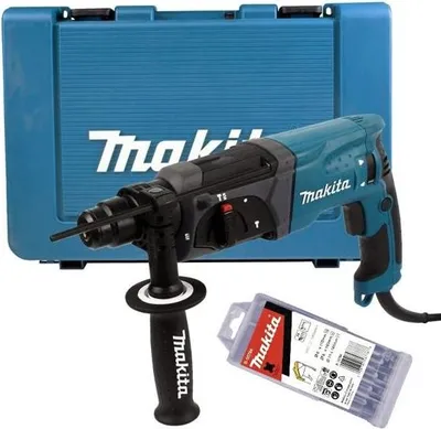 A Makita rotary hammer drill with its case and a set of drill bits.