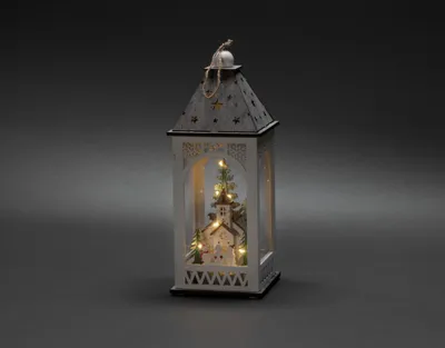 Produktbild von Konstsmide LED Holzlaterne mit Kirche, weiß, 6h Timer, 8 warm weiße Dioden, batteriebetrieben, Innen, Batterie: 2 x AA 1,5V (exkl.) - 3271-210
