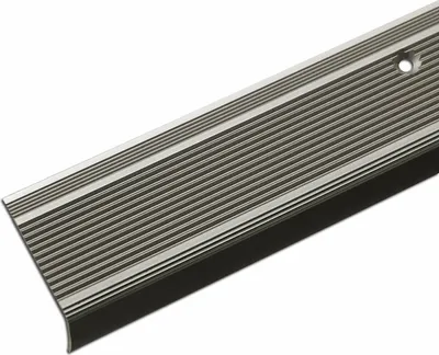 A close-up, angled view of a silver-colored metal stair nosing profile with a black rubber insert, set against a white background.