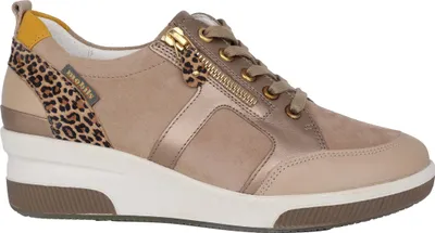 A side view of a women's sneaker.
