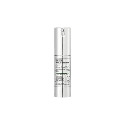 A silver pump bottle of skincare product against a white background.