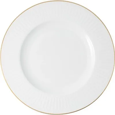 A white plate with a gold rim and a subtle embossed pattern on the rim.